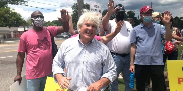 Buddy Parker walks with members of the Special Ops prayer ministry in Birmingham, Ala.