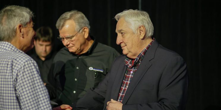 Author, Joe Beam, right, stands with a group of men.