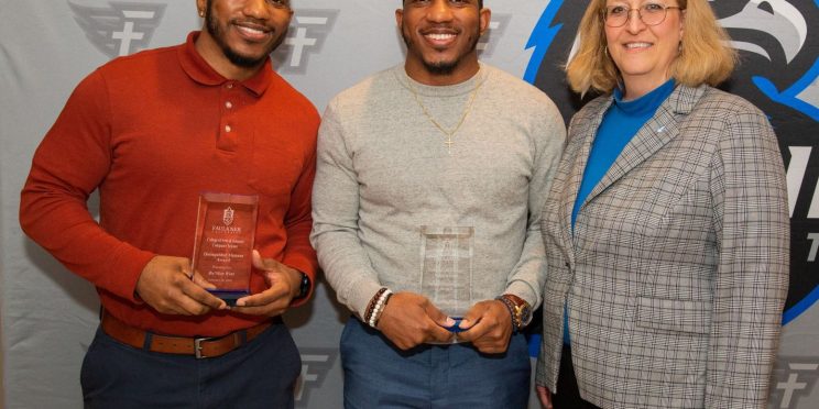 Ra'Mon and Ty'Ron West stand with Dr. Susan Hammon.