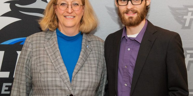 Christopher Smith, right, stands with Dr. Susan Hammond.