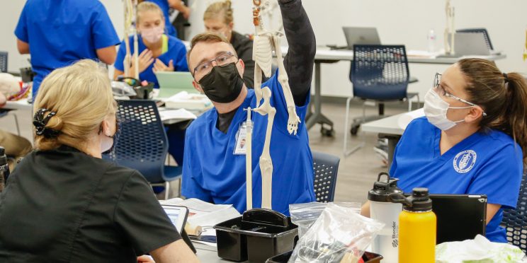 College of Health students conduct class in one of the new labs.