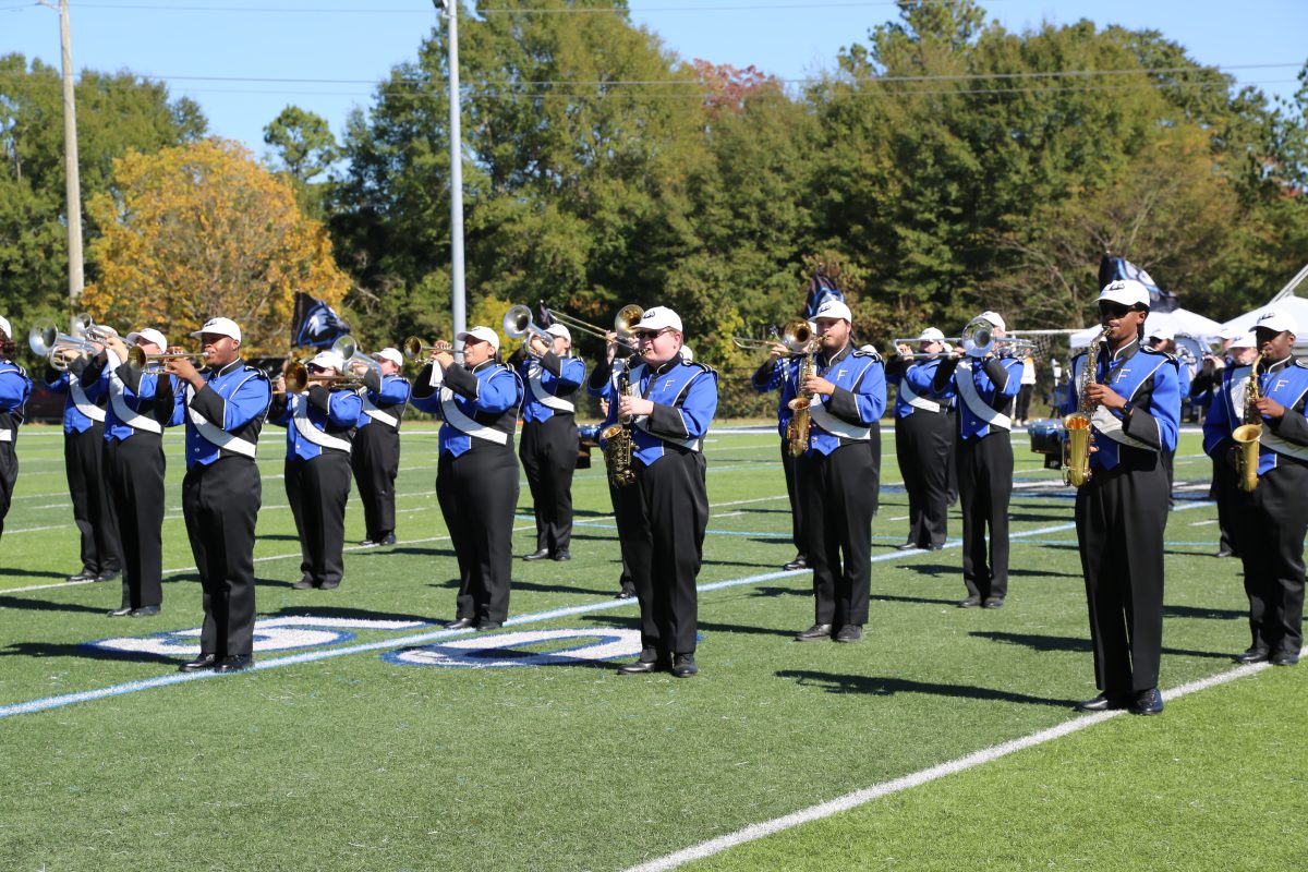 Students with the "Marching Eagles" band perform at halftime during the 2025 Homecoming Game.