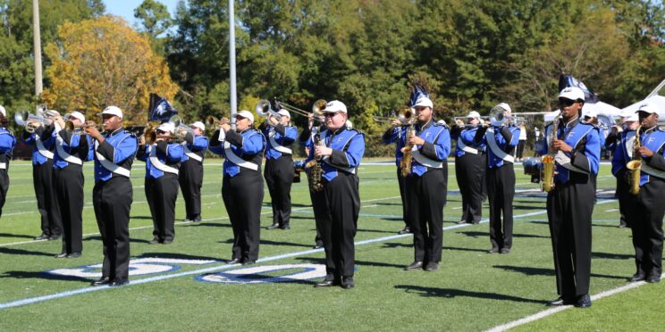 Students with the "Marching Eagles" band perform at halftime during the 2025 Homecoming Game.