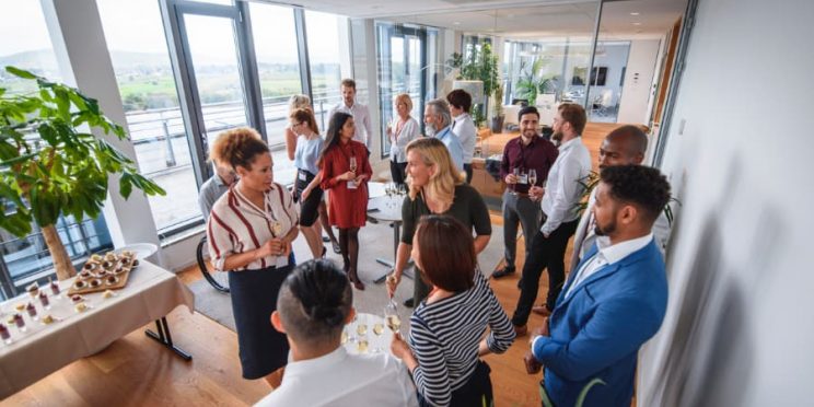 Business colleagues conversing at gathering