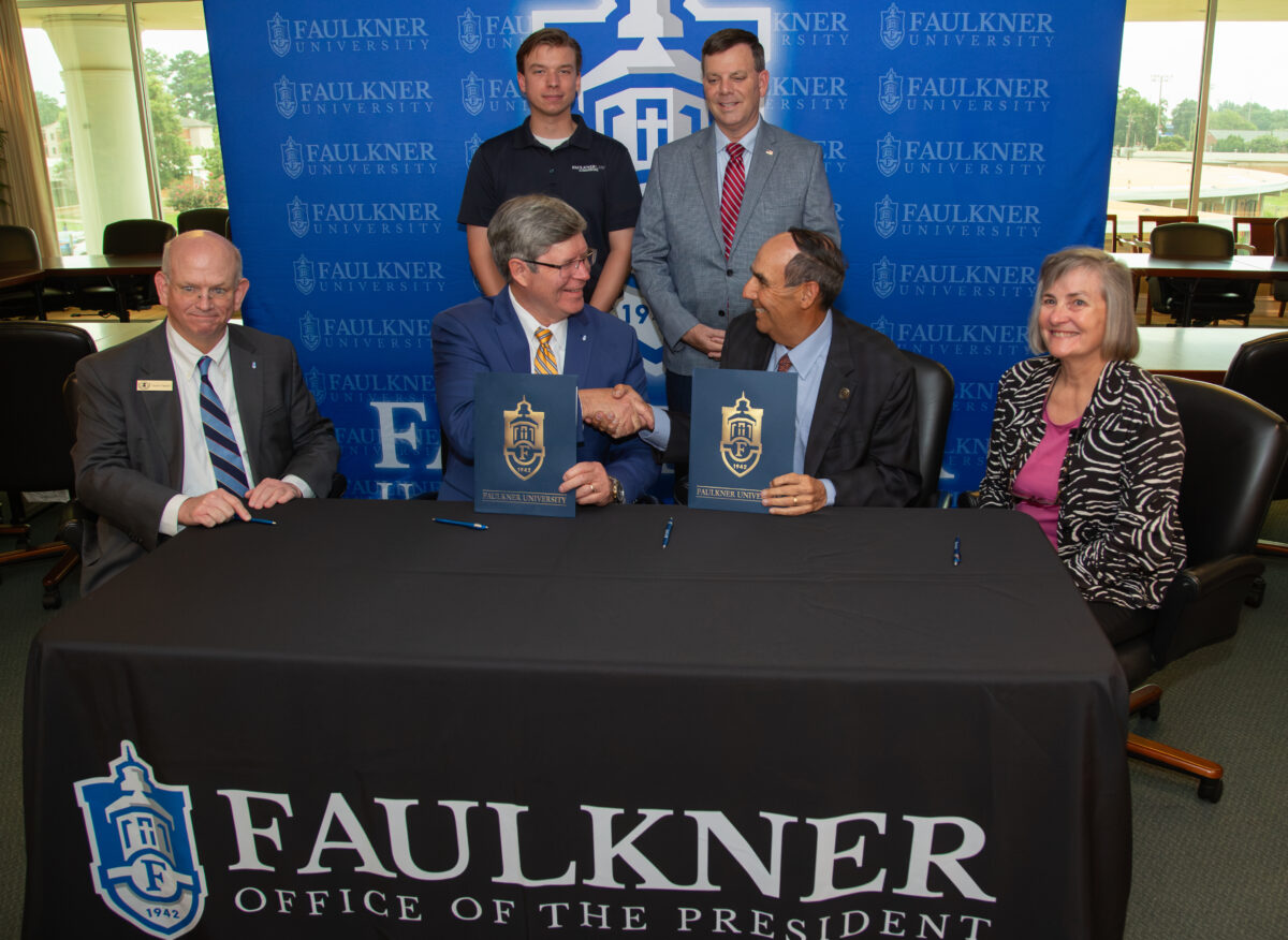 Cutline: Back row l-r Dylan Boyd, Daryl Bailey. Front row l-r Dean Charles Campbell, Faulkner President Mitch Henry, AUM Chancellor Carl Stockton and AUM Interim Dean Dr. Lynn Stallings