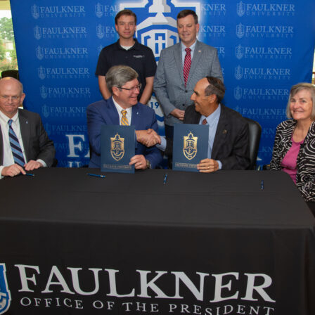 Cutline: Back row l-r Dylan Boyd, Daryl Bailey. Front row l-r Dean Charles Campbell, Faulkner President Mitch Henry, AUM Chancellor Carl Stockton and AUM Interim Dean Dr. Lynn Stallings