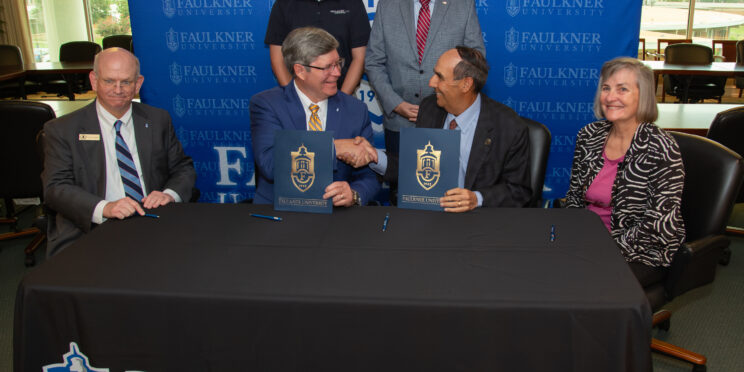 Cutline: Back row l-r Dylan Boyd, Daryl Bailey. Front row l-r Dean Charles Campbell, Faulkner President Mitch Henry, AUM Chancellor Carl Stockton and AUM Interim Dean Dr. Lynn Stallings