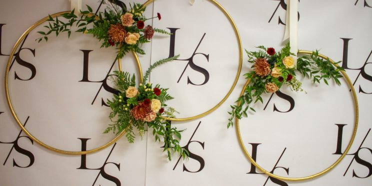 Three Golden Hoops with Flower Arrangements