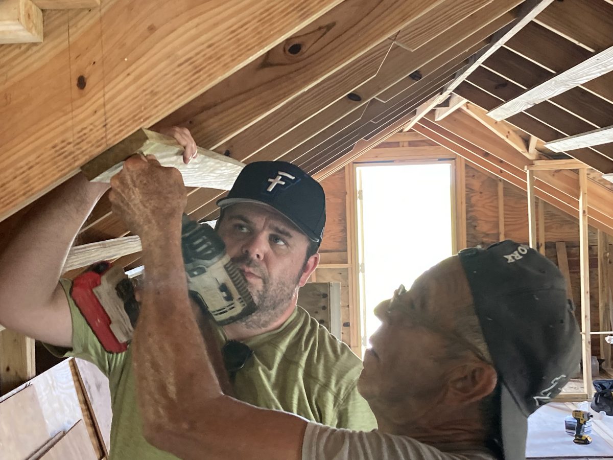 Kasey Oakley and Donald Burrows construct an apartment above the church building.