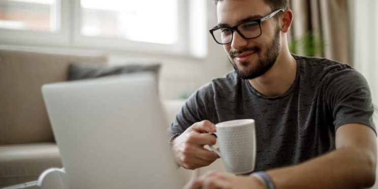 Man Studies At Home