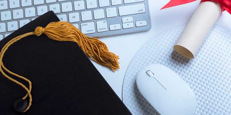 College Degree and Graduate Cap with Computer Mouse and Keyboard