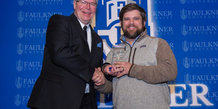 Page Clayton is awarded Distinguished Alumnus during the 2025 Marketplace Faith Friday Forums.
