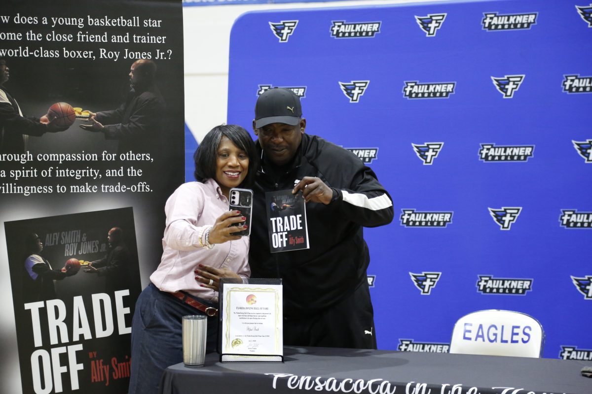 Alfy Smith poses with a fan.