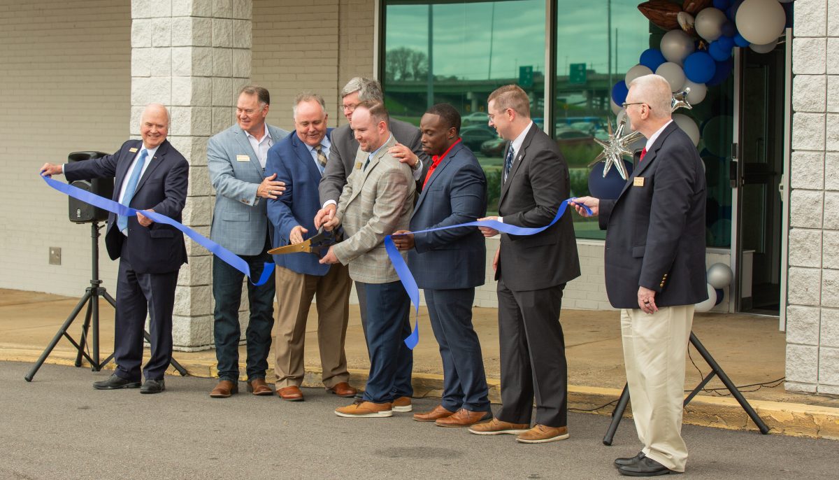 Ribbon cutting in front of the new Mental Health Center. 