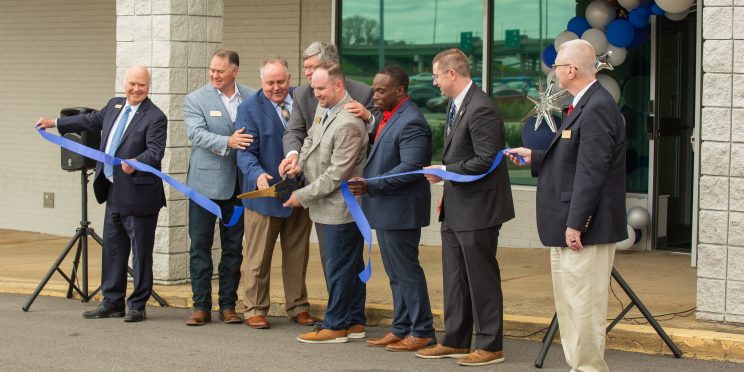 Ribbon cutting in front of the new Mental Health Center.