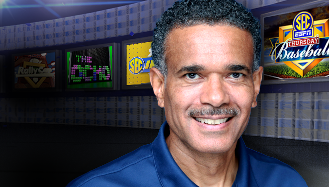 Tommie Lee Washington, in front of ESPN monitors, is coming to lead Faulkner's new digital media degree.