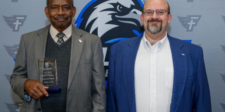l-r Matthew Conley and Dr. Todd Brenneman pose after Conley was honored during the Marketplace Faith Friday Forums for his service in the classroom and prison ministry.