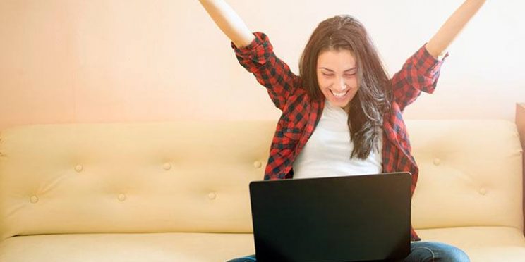 Student Celebrating During Online Class