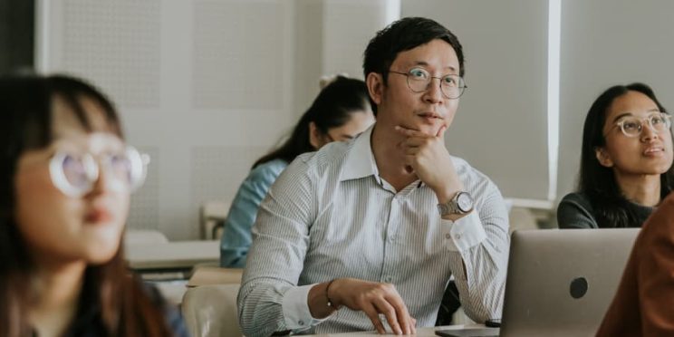 Master’s degree students learning in classroom